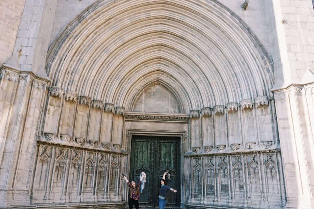 2. Explore Girona Cathedral (and Find the Witch!) Girona has a sprawling cathedral which was built across seven centuries, so just looking at the varying styles of architecture from outside is interesting (without paying the 7 € entry fee). Make sure to spot the witch! Legend has it that one of the many gargoyles which spout rain water from the Cathedral's top ledge is a witch who used to throw stones at the Cathedral. She was turned into a Gargoyle as punishment so no more curses would come from her mouth. She's really there - see if you can find her!