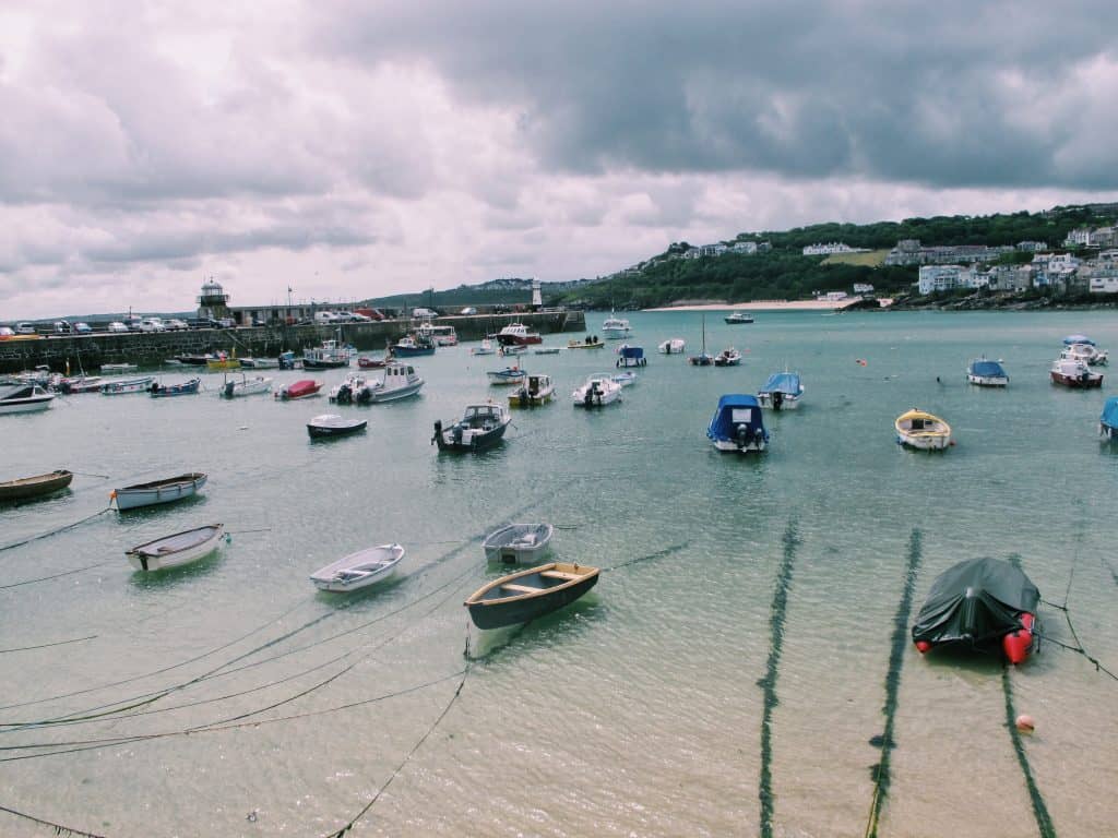 The best city in Cornwall for a day trip: you must take a St Ives day trip. Enjoy my photo journal, hotel, and food advice for the best St Ives day trip!