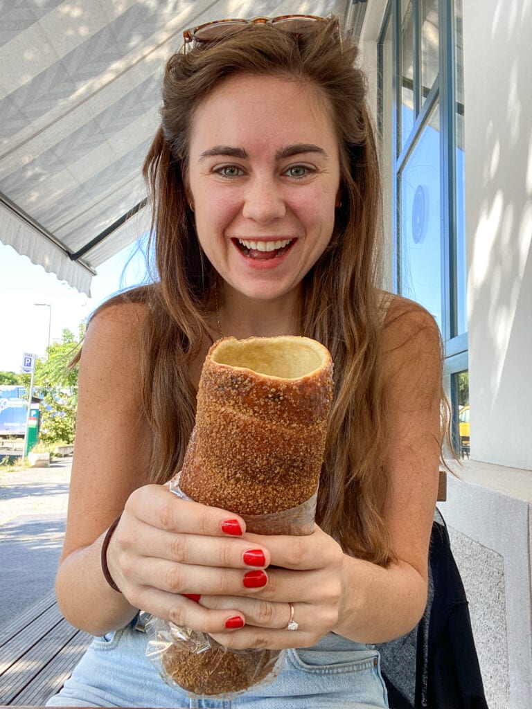 Sarah smiles with gluten free chimney cake budapest