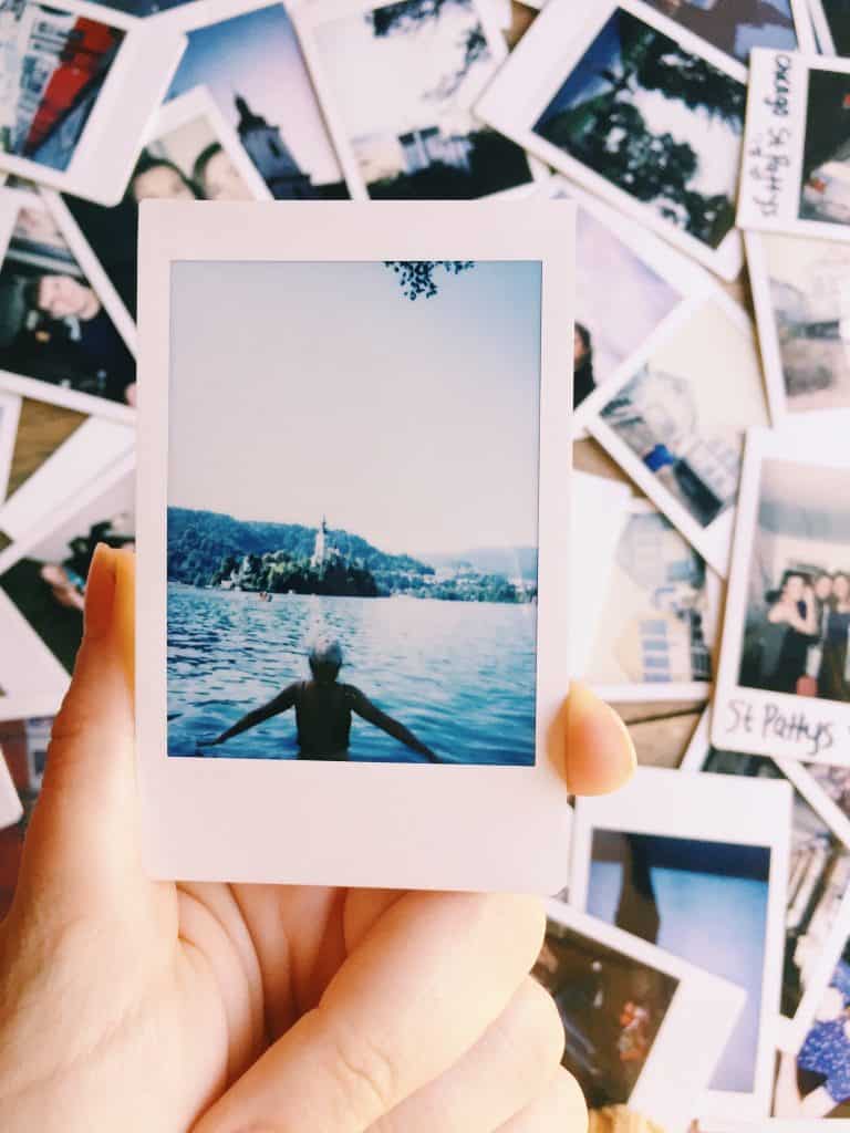 Polaroid cameras are making a comeback! Here are the best travel polaroid cameras and accessories, and how to travel with them! #travelphotography #polaroid #polaroid camera #impossiblefilm #instax #fujifilminstax #travelpolaroid