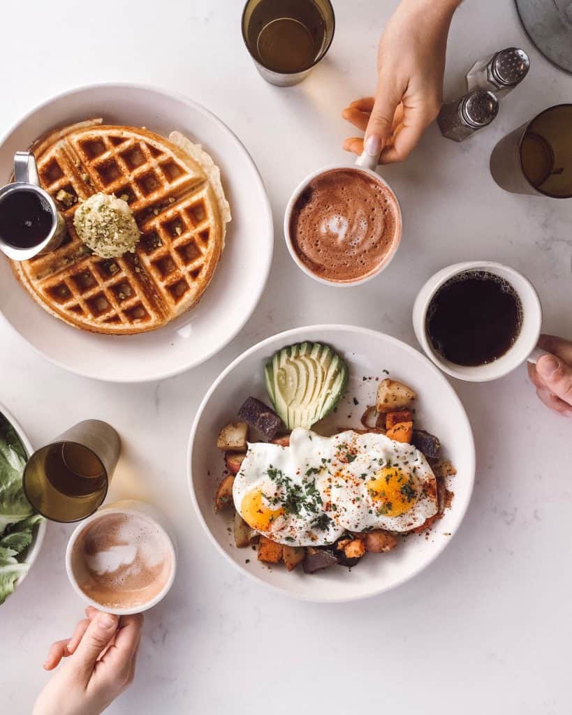 Check out this list of the best gluten free Detroit restaurants with safe cross contamination procedures! From gluten free pancakes to pizza to waffles. #glutenfreedetroit #detroit #detroitmichigan #glutenfreetravel #puremichigan