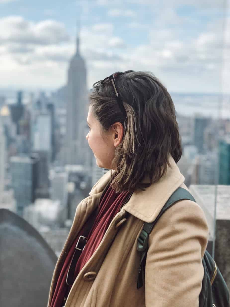 In this minimalist's carry on only packing list, you'll find a complete guide to traveling carry on only. Including the best multi-way clothing and more. #carryononly #carryontravel #carryon #encircled #chrysaliscardi #travel
