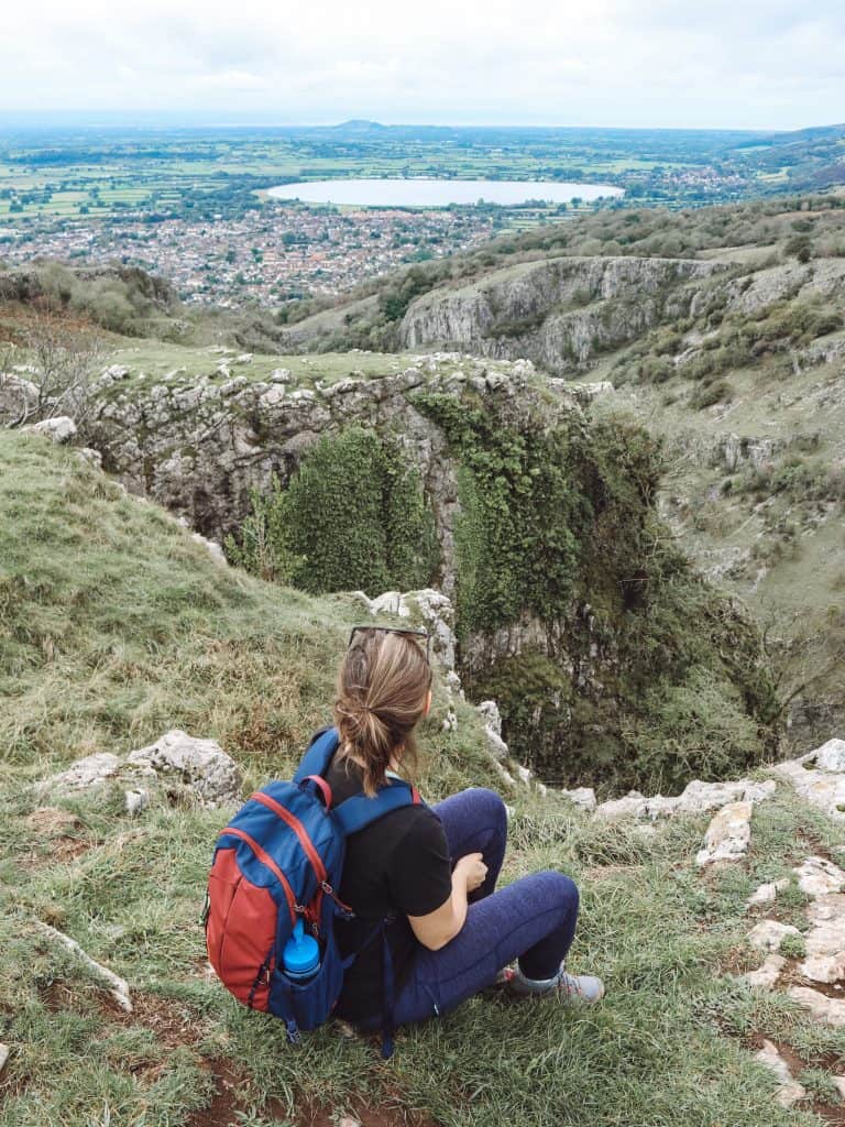 A visit to Cheddar Gorge in Somerset, England is the perfect time to get outdoors. Enjoy stunning panoramic views on these 11 Cheddar Gorge walks. #cheddargorgewalks #walksincheddargorge #somerset #mendiphills #cheddargorge #thingstodoincheddargorge