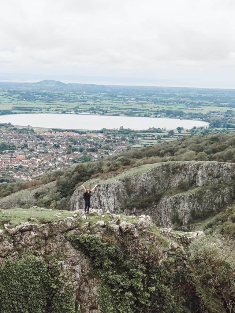 A visit to Cheddar Gorge in Somerset, England is the perfect time to get outdoors. Enjoy stunning panoramic views on these 11 Cheddar Gorge walks. #cheddargorgewalks #walksincheddargorge #somerset #mendiphills #cheddargorge #thingstodoincheddargorge