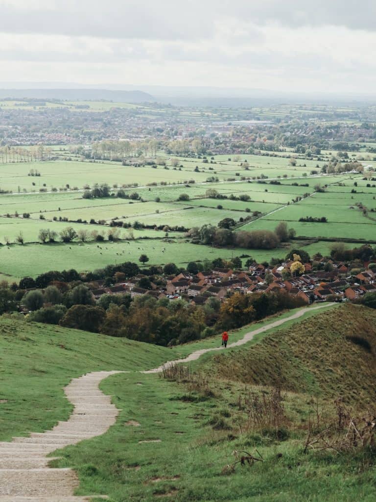 A visit to Cheddar Gorge in Somerset, England is the perfect time to get outdoors. Enjoy stunning panoramic views on these 11 Cheddar Gorge walks. #cheddargorgewalks #walksincheddargorge #somerset #mendiphills #cheddargorge #thingstodoincheddargorge