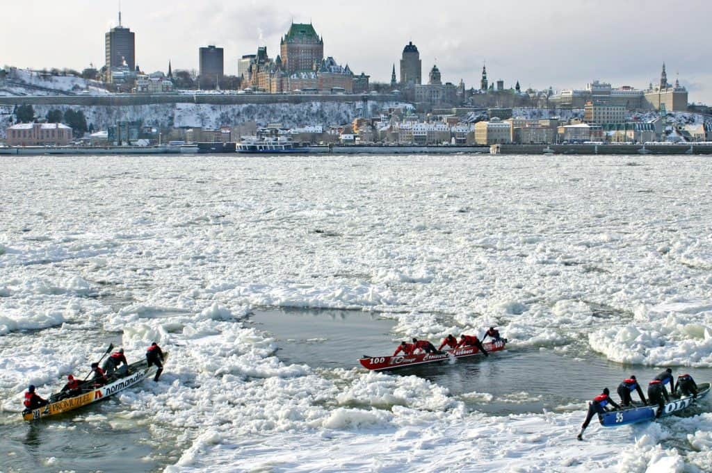 Ice canoeing across the Saint Lawrence river.