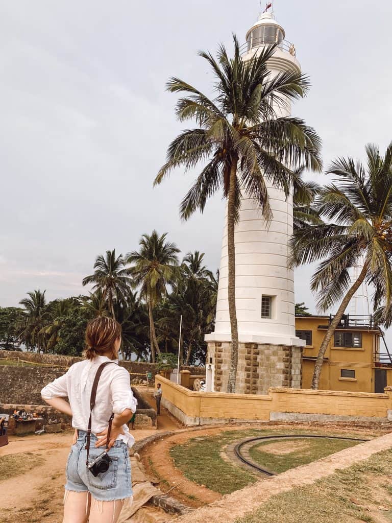 A complete guide to places to visit in Galle, Sri Lanka. Includes 13 amazing things to do in Galle from stilt fishing, bike tours, restaurants, and more. #gallesrilanka #thingstodoingalle #thingstodoingallesrilanka