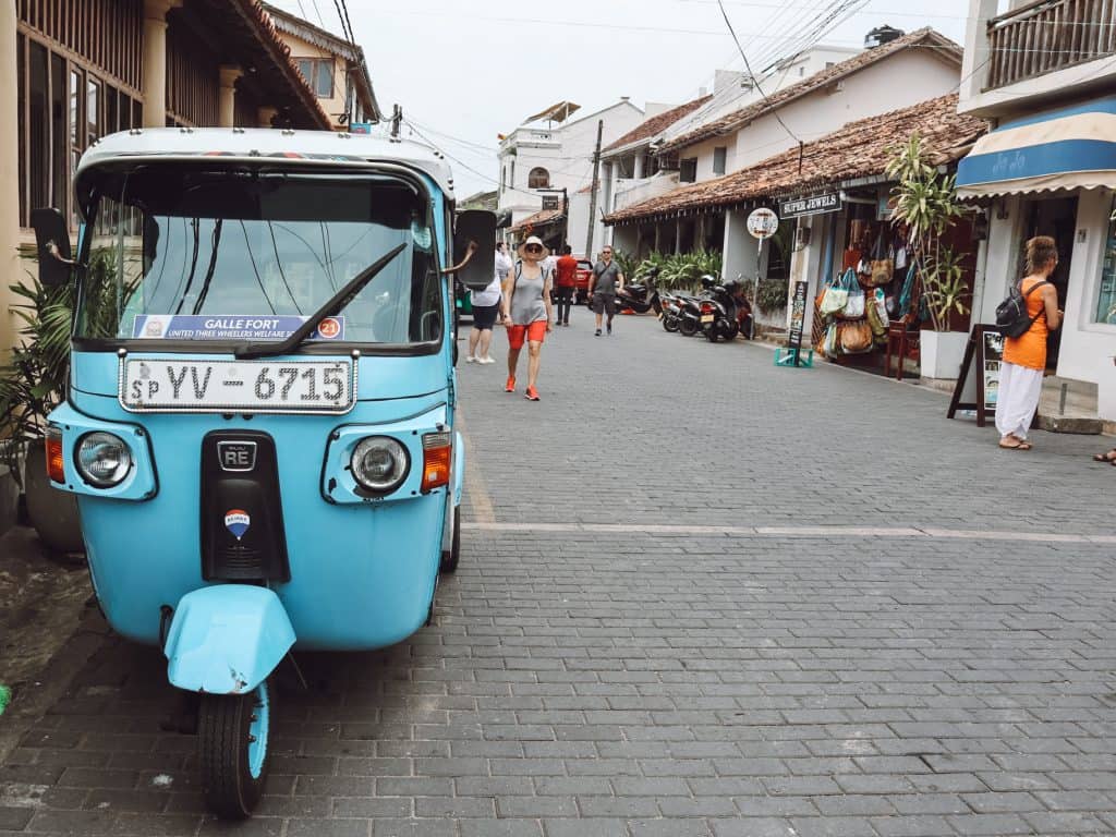 A complete guide to places to visit in Galle, Sri Lanka. Includes 13 amazing things to do in Galle from stilt fishing, bike tours, restaurants, and more. #gallesrilanka #thingstodoingalle #thingstodoingallesrilanka