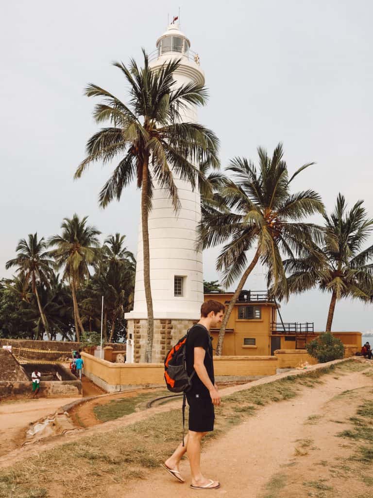 A complete guide to places to visit in Galle, Sri Lanka. Includes 13 amazing things to do in Galle from stilt fishing, bike tours, restaurants, and more. #gallesrilanka #thingstodoingalle #thingstodoingallesrilanka