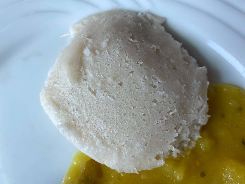 A classic Idly - steamed and fermented lentil and rice patty served with breakfast in South India.