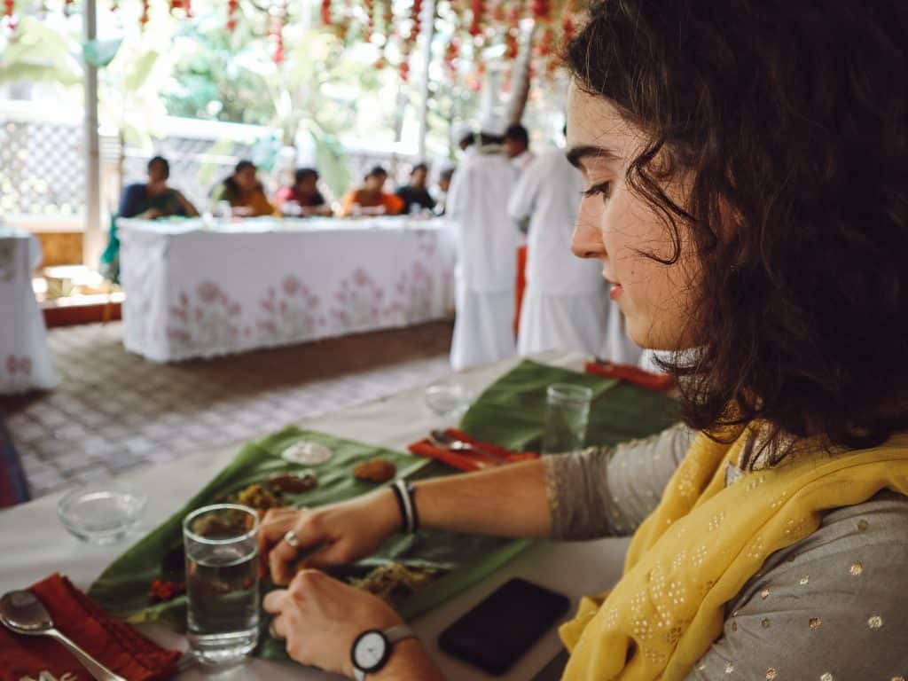 Alexia demonstrated eating off a banana leaf in south India.