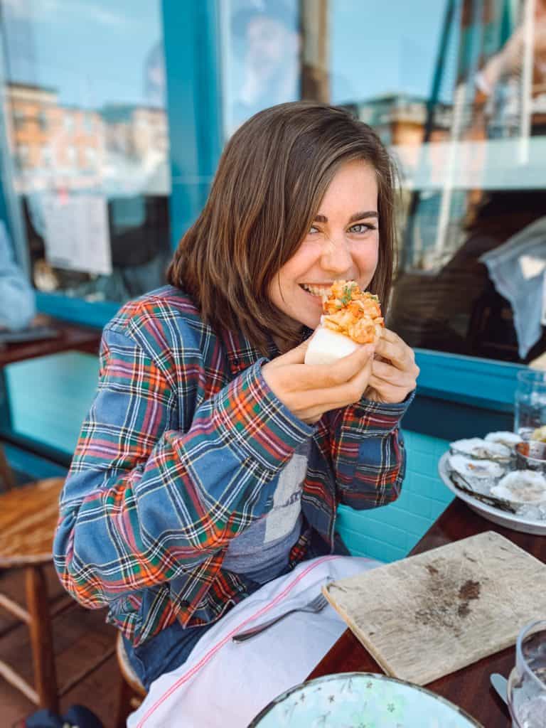 Eating the gluten free lobster roll at Eventide Oyster Company.