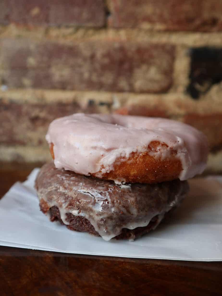 Two gluten free donuts stacked