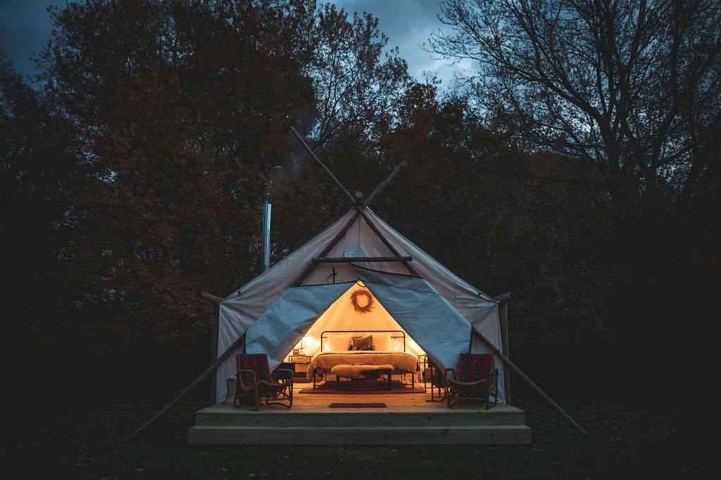 Ready to head Up North - but don't want to bring the tent? Glamping in Michigan is your answer! Check out Michigan's top 15 glamping sites.