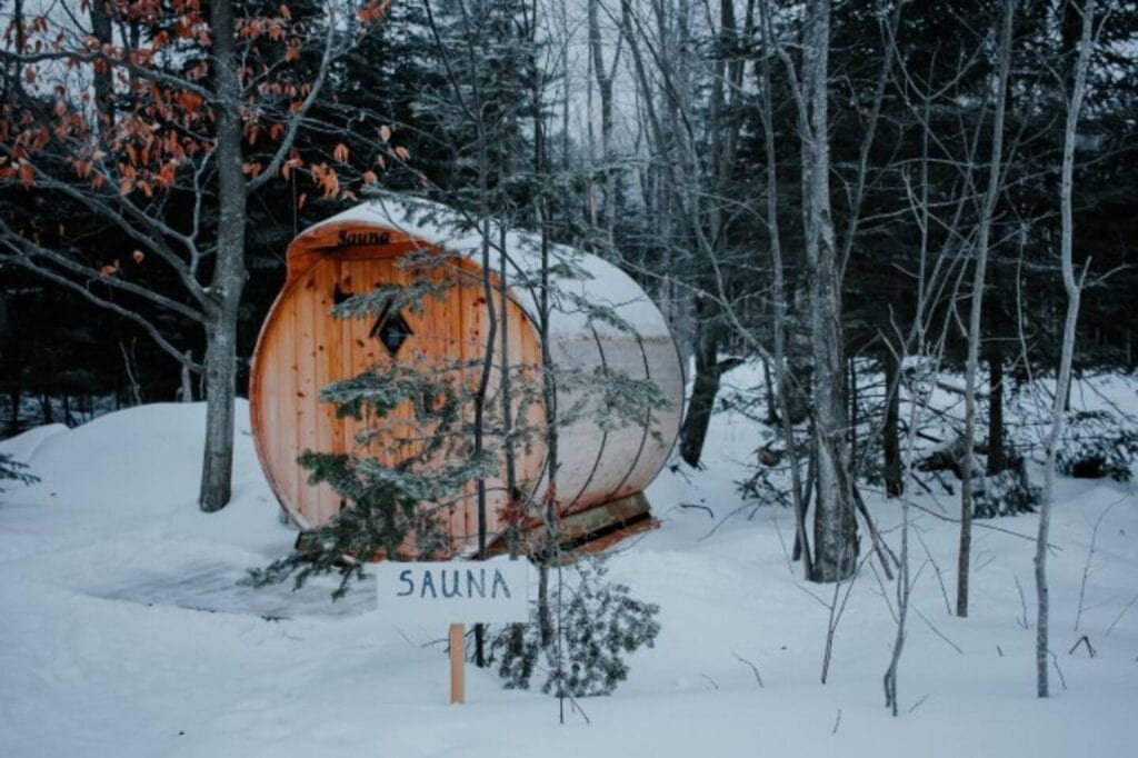 Romantic sauna in surrounded by snow.