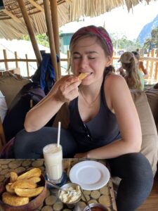 Sarah eating potato wedges in sri lanka