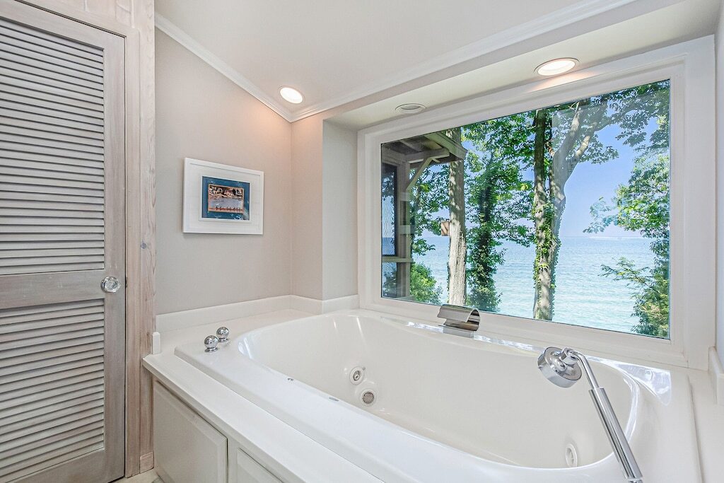 Romantic bathroom jacuzzi overlooking Lake Michigan.