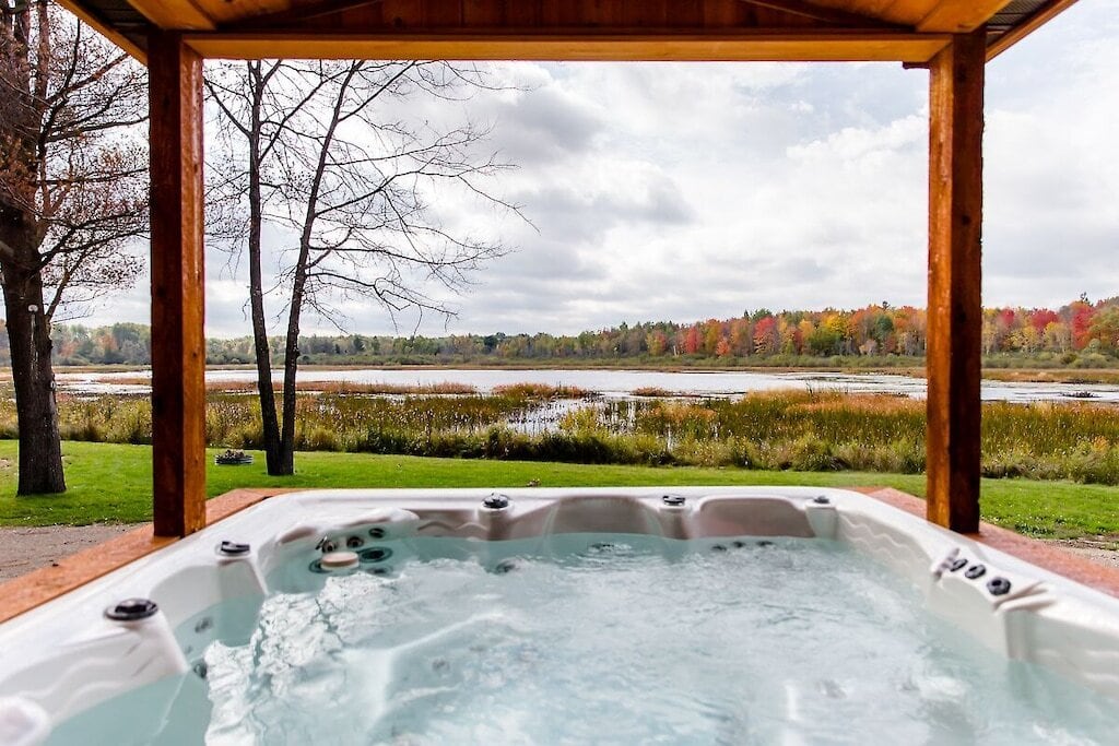 Luxury outdoors jacuzzi on a fall day.