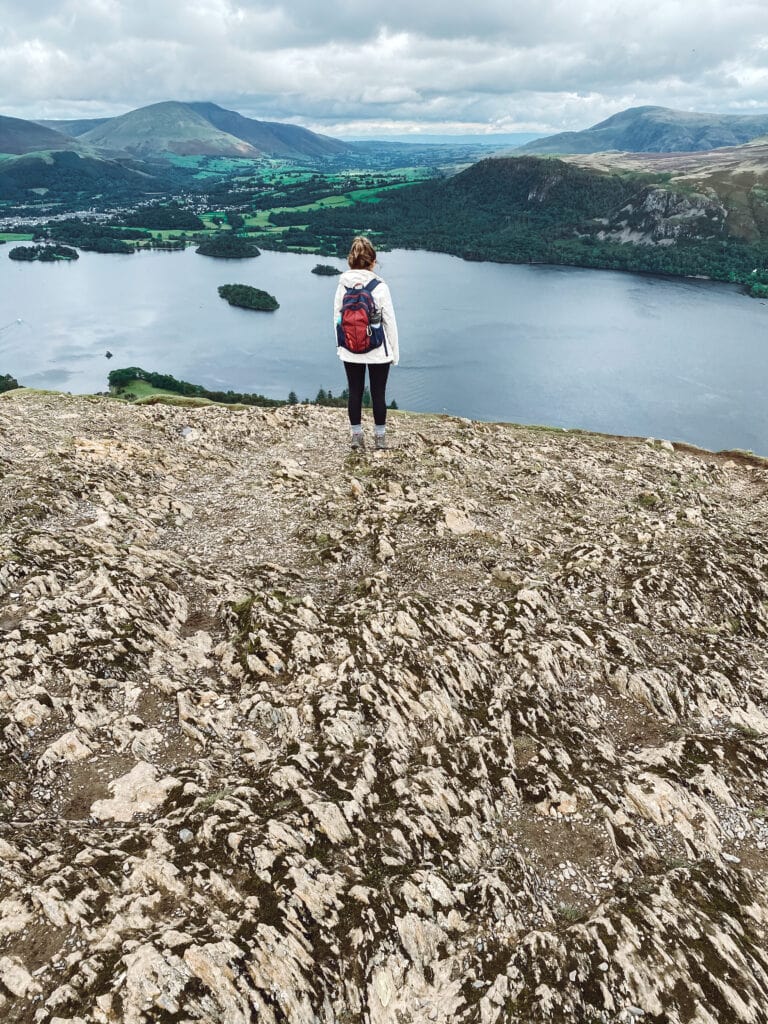 Sarah standing on rocks at Catbells