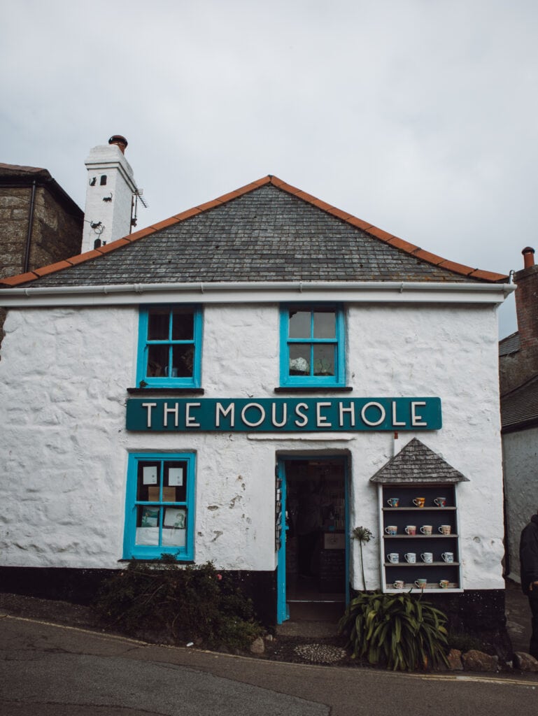 Blue and white mousehole house.