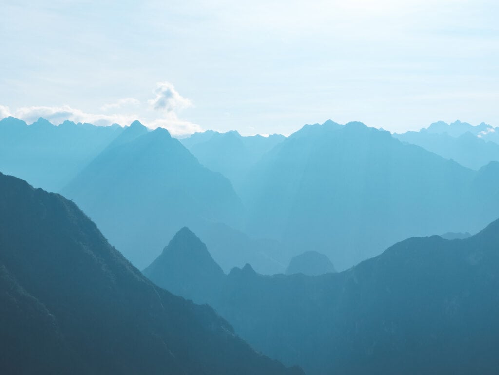 Blue misty mountains for miles in Peru, looking toward Machu Picchu from the salkantay trek