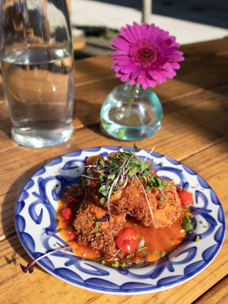 gluten free fried oysters with pink flower in background