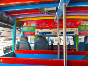 Colorful inside of a chiva in Colombia, part of the journey from Salento to Jardin.
