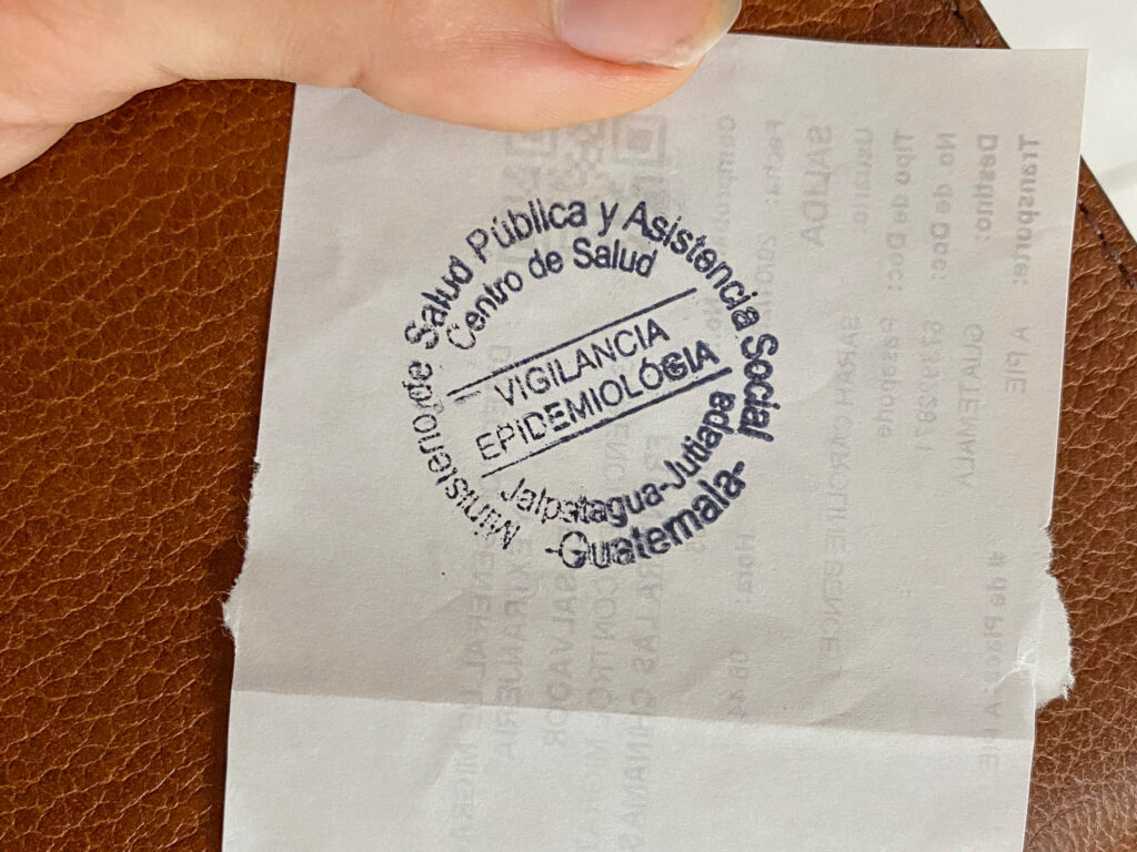 A stamp on a white receipt.