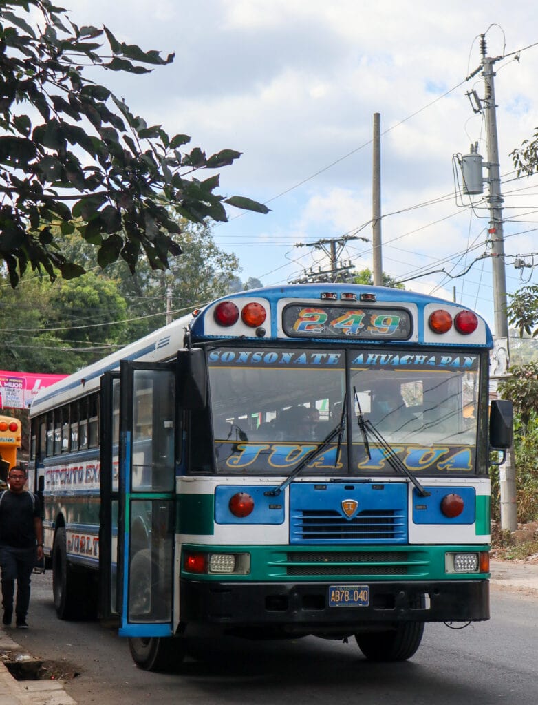 A chicken bus in El Salvador that says 249 Sonsonate Ahuachapan on the front.