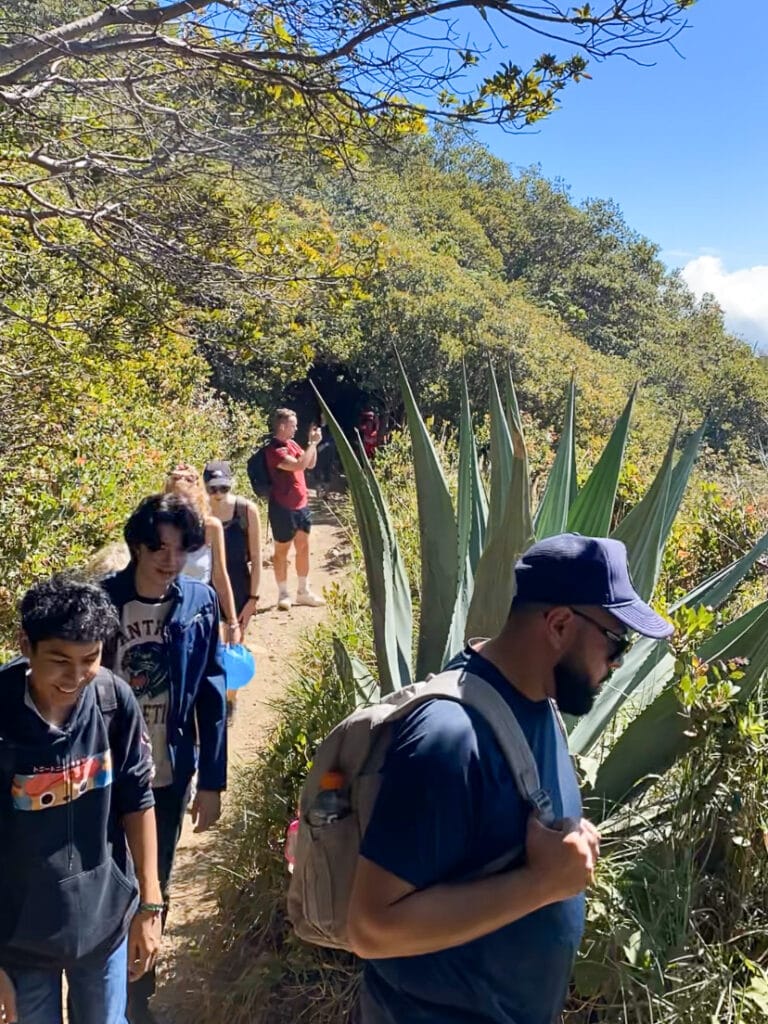Crowd of people on hiking trail