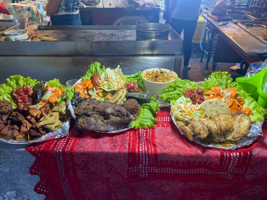 Grilled meat platters on display at the Juayua food festival.