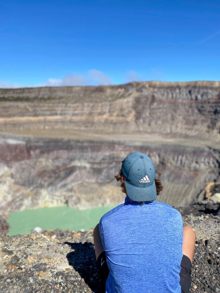 Dan sits looking out at volcano.
