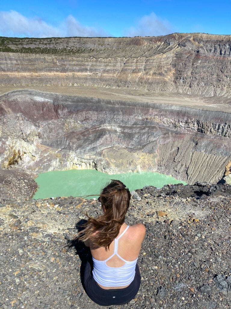 Sarah sits and looks out at Santa Ana Volcano views.