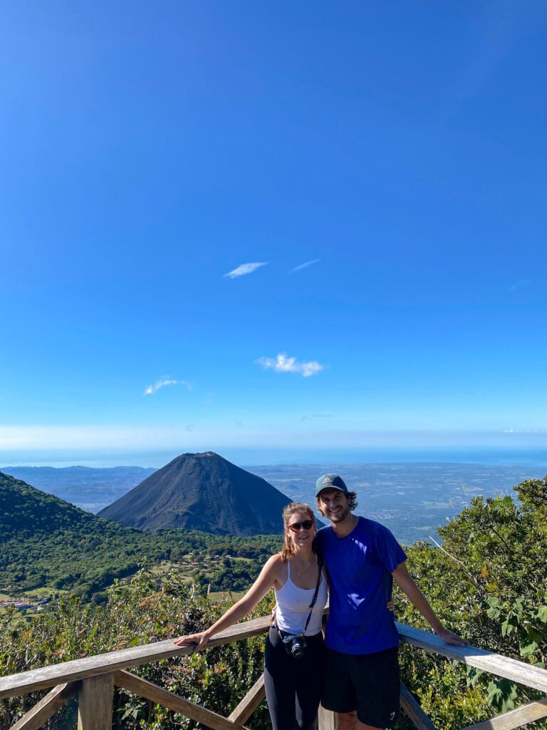 Dan and Sarah smile in front of viewpoint to Izalco Volcano.