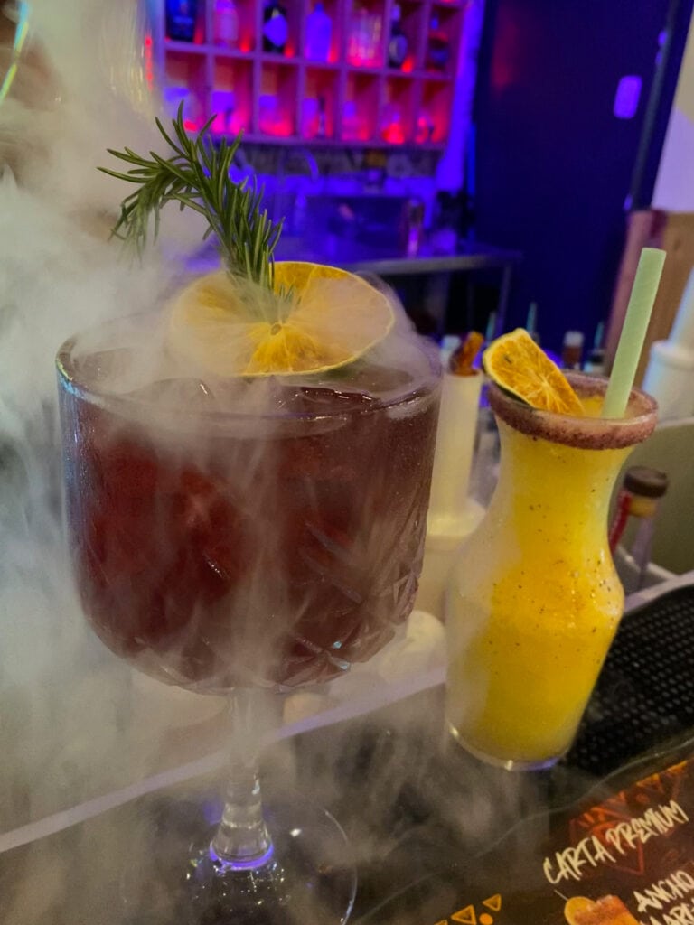 a cocktail with dry ice