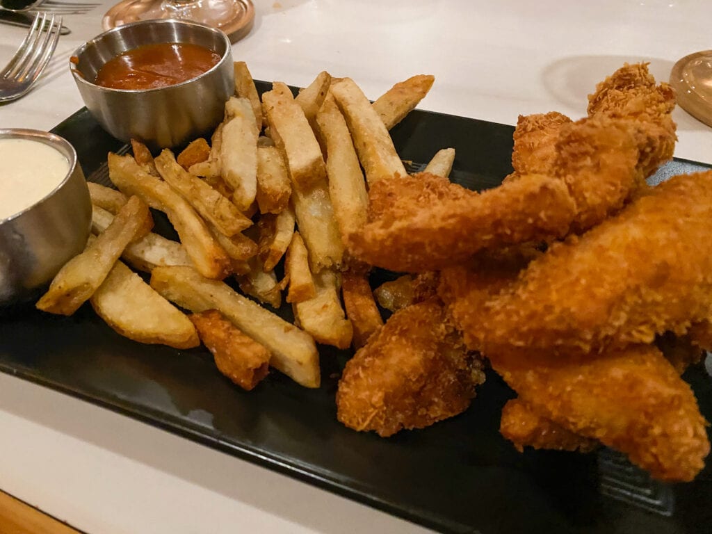 gluten free fried chicken tenders and french fries.