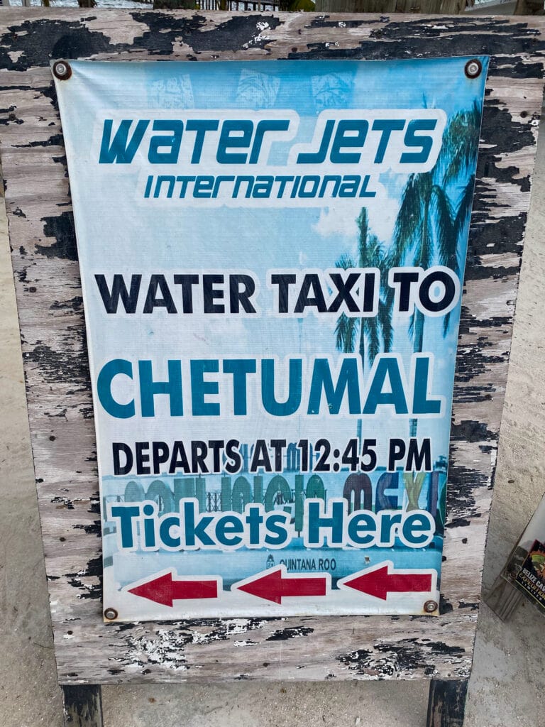 A sign that says Water Jets International, water taxi to Chetumal.