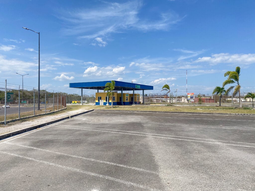 An empty parking lot at the Belize to Mexico border crossing.