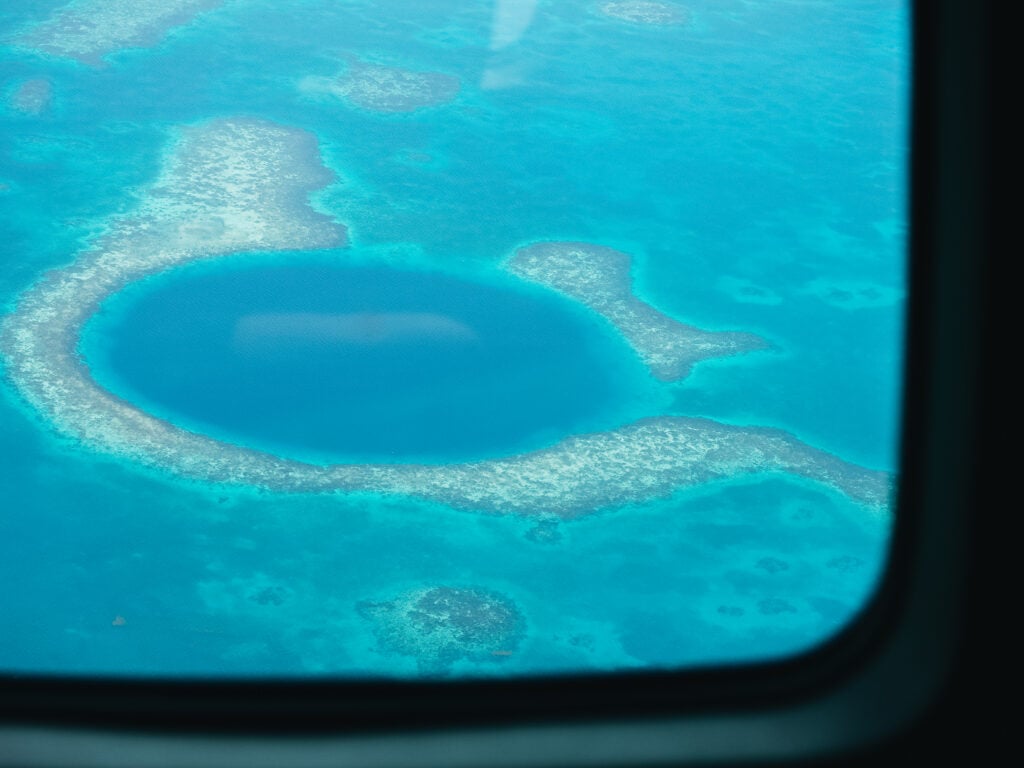 Blue Hole Belize viewed from an airplane window.