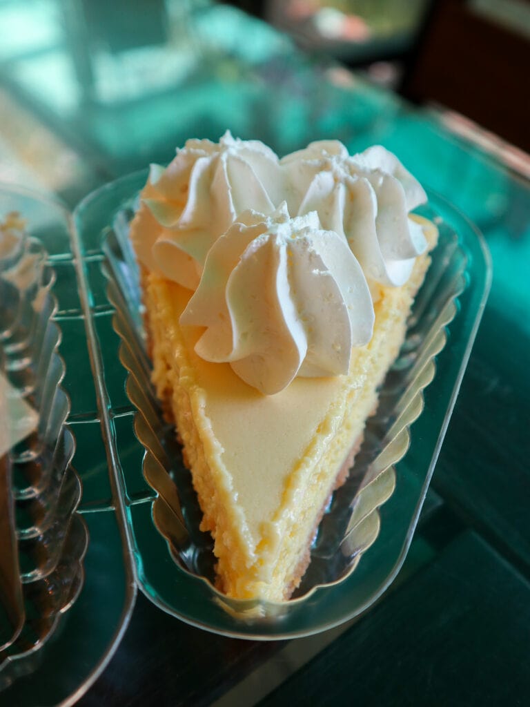 GF key lime pie with a whipped cream topping.