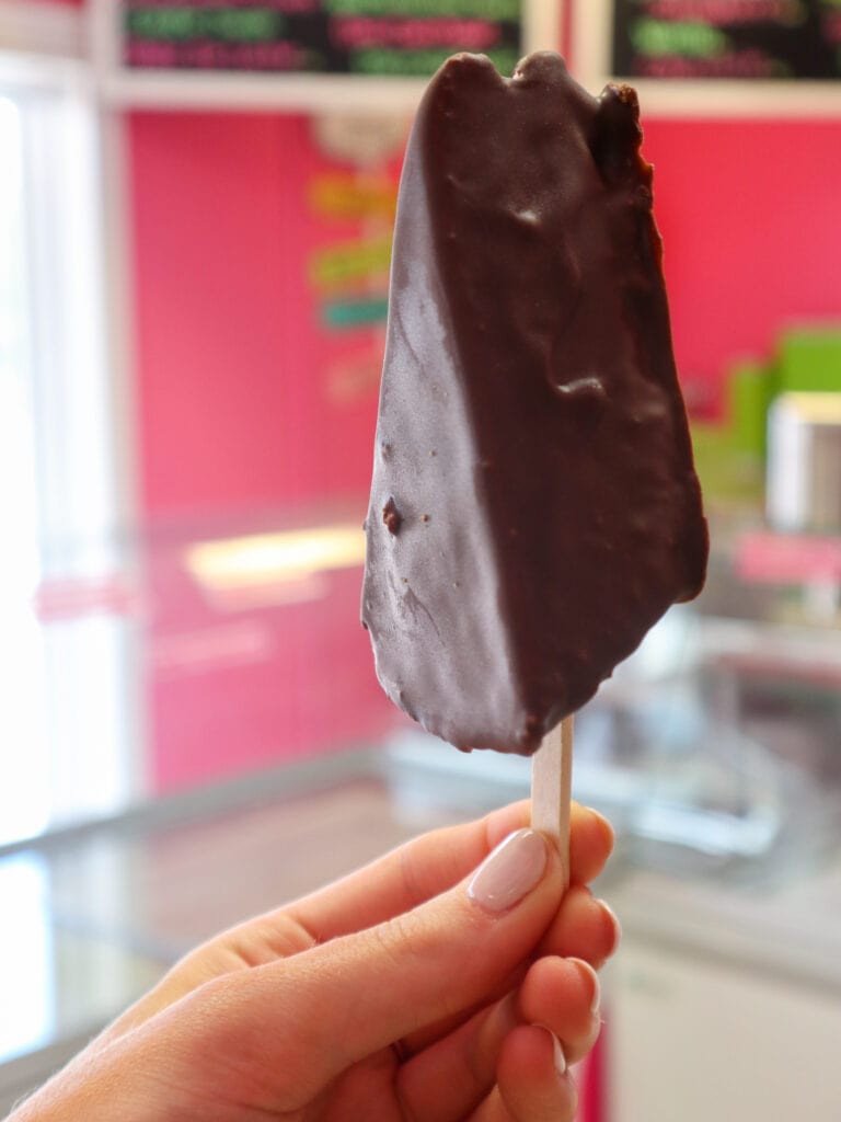 Chocolate covered gluten free key lime pie on a stick.
