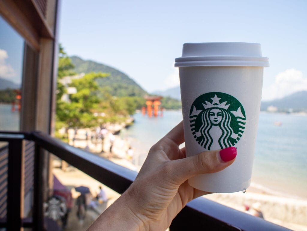 Starbucks Miyajima Island with view of torii gates.