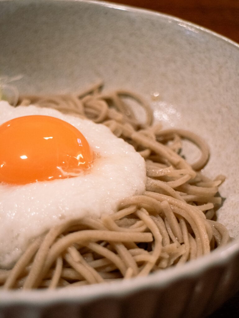 Egg on top of gluten free soba.