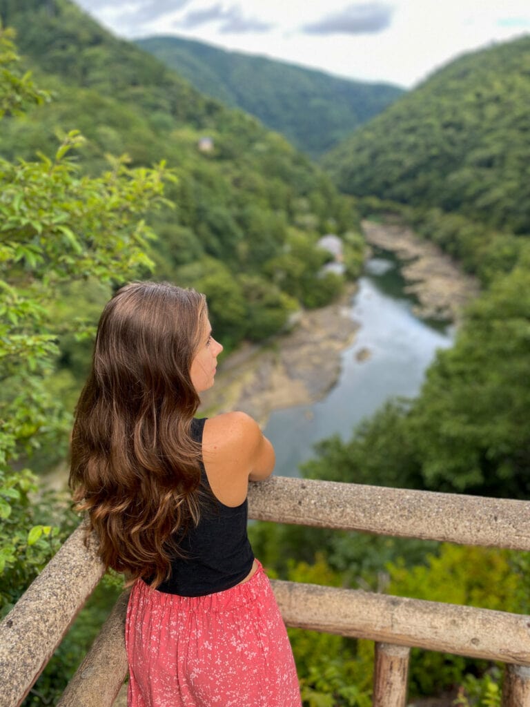 Sarah in Arashiyama over the gorge.