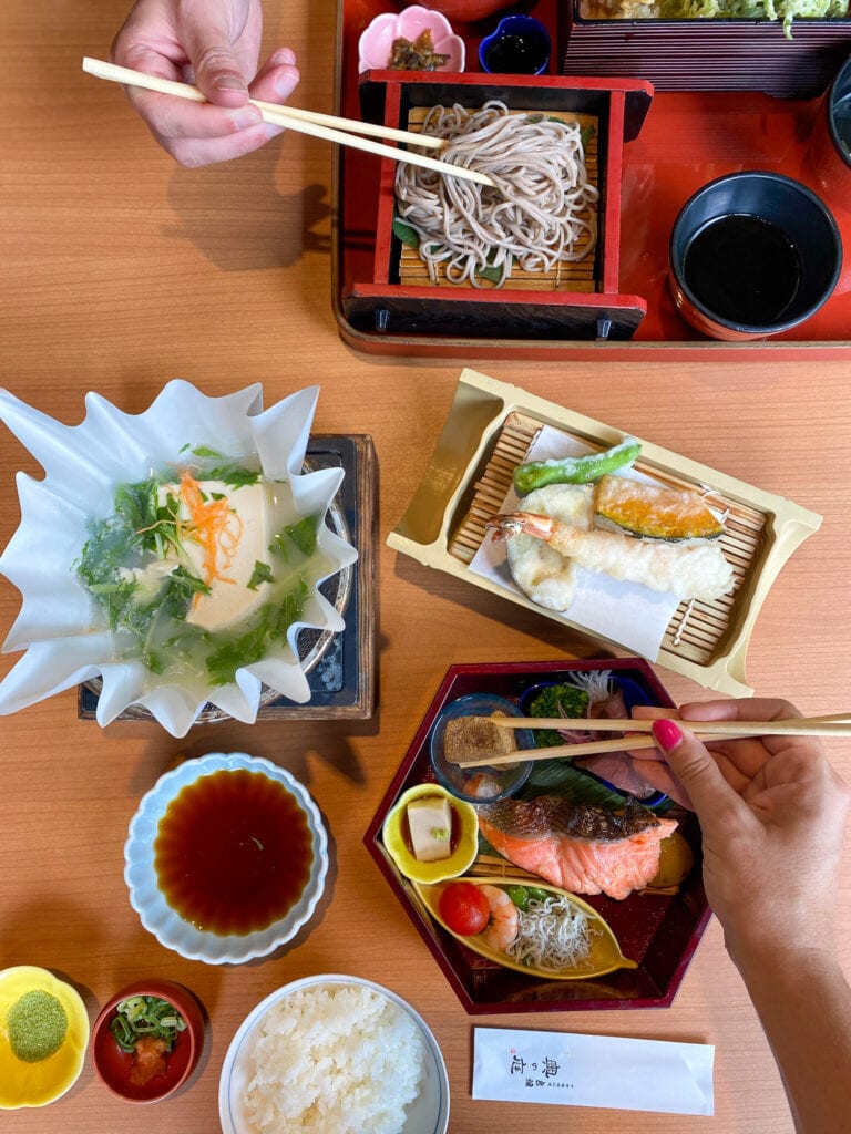 Overhead shot of a table set with multiple course Japanese set menu lunch, fully gluten free.
