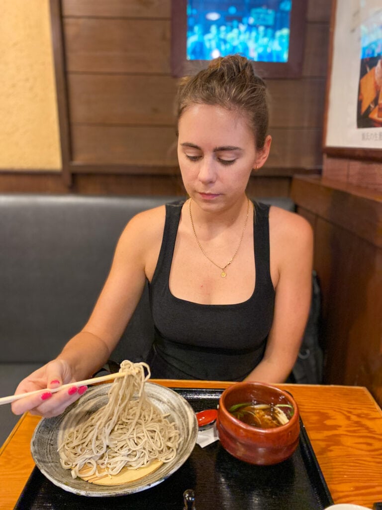 Sarah eating gluten free soba at Genji Soba in Osaka.