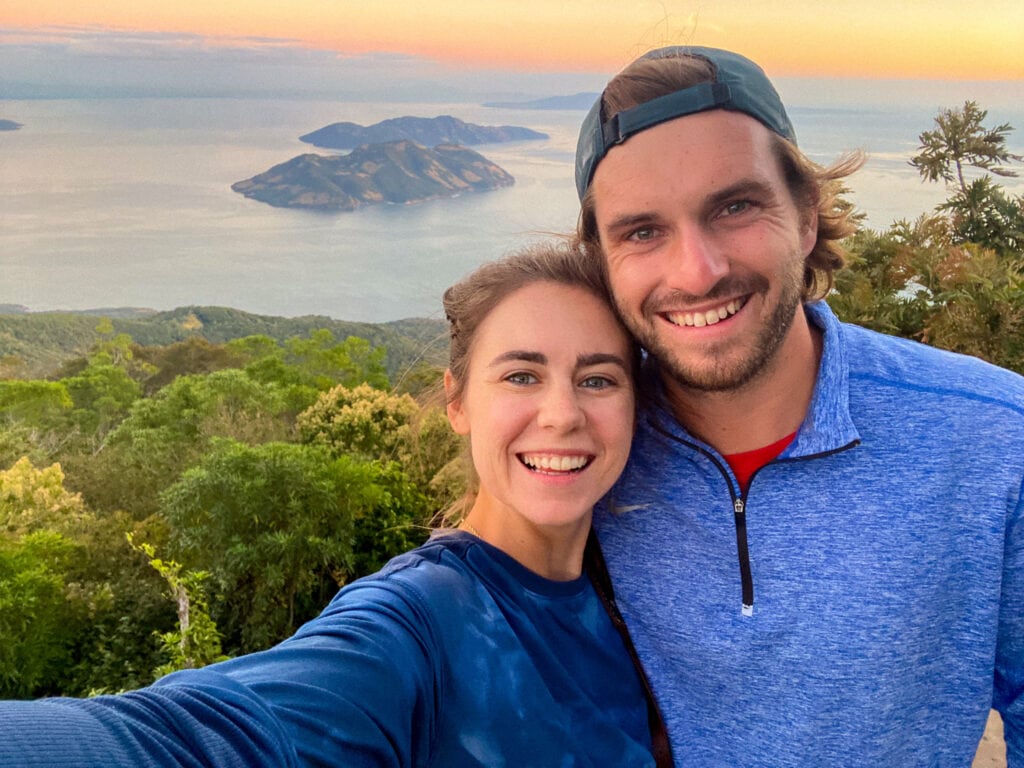 Sarah and Dan smile in selfie on conchagua volcano el salvador