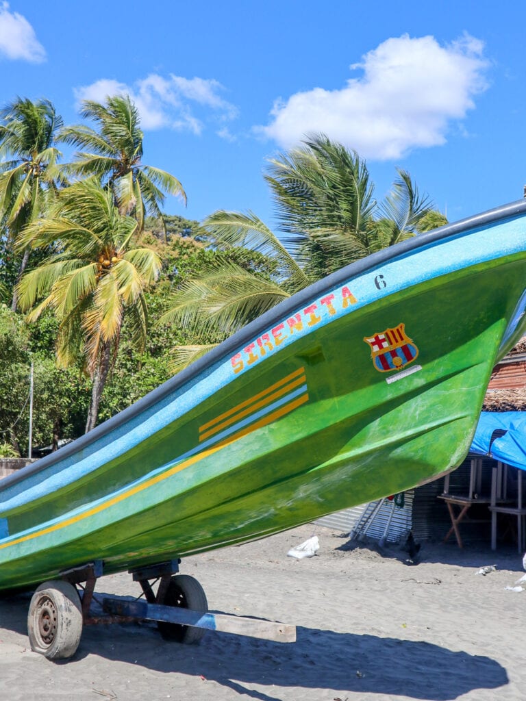 fishing boat on beach in el salvador