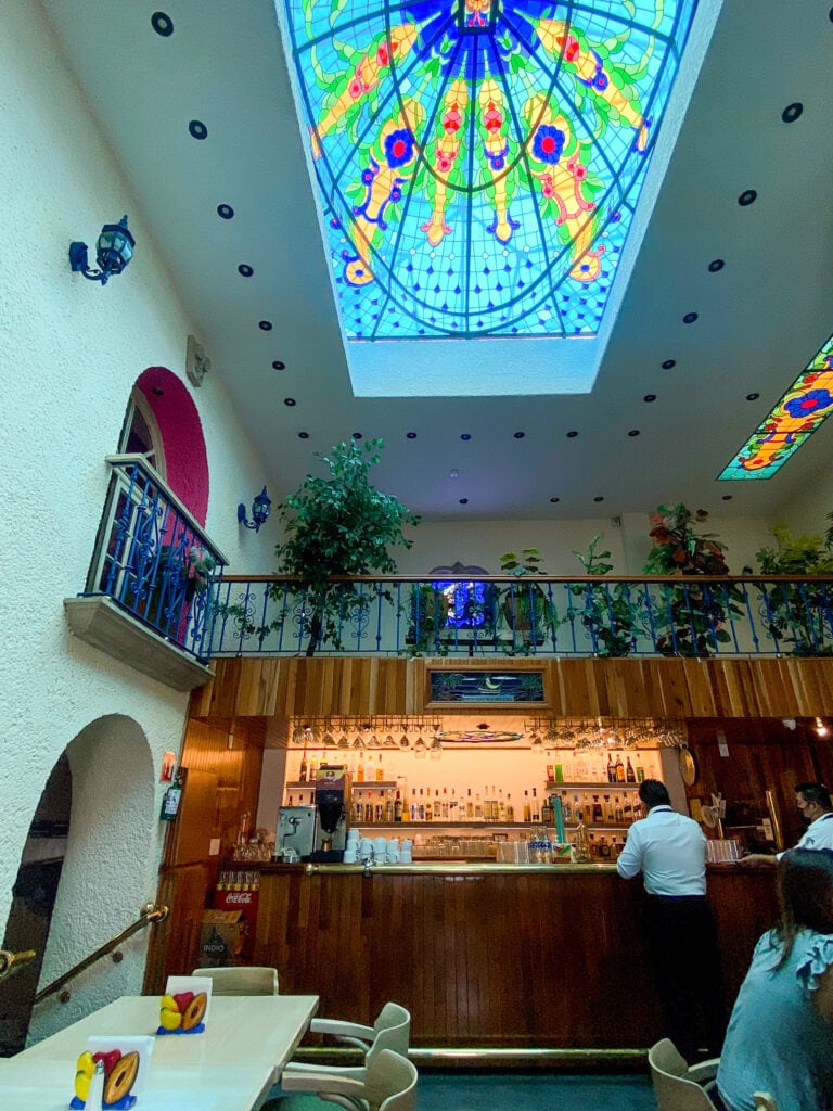 stained glass ceiling in mexico city taqueria