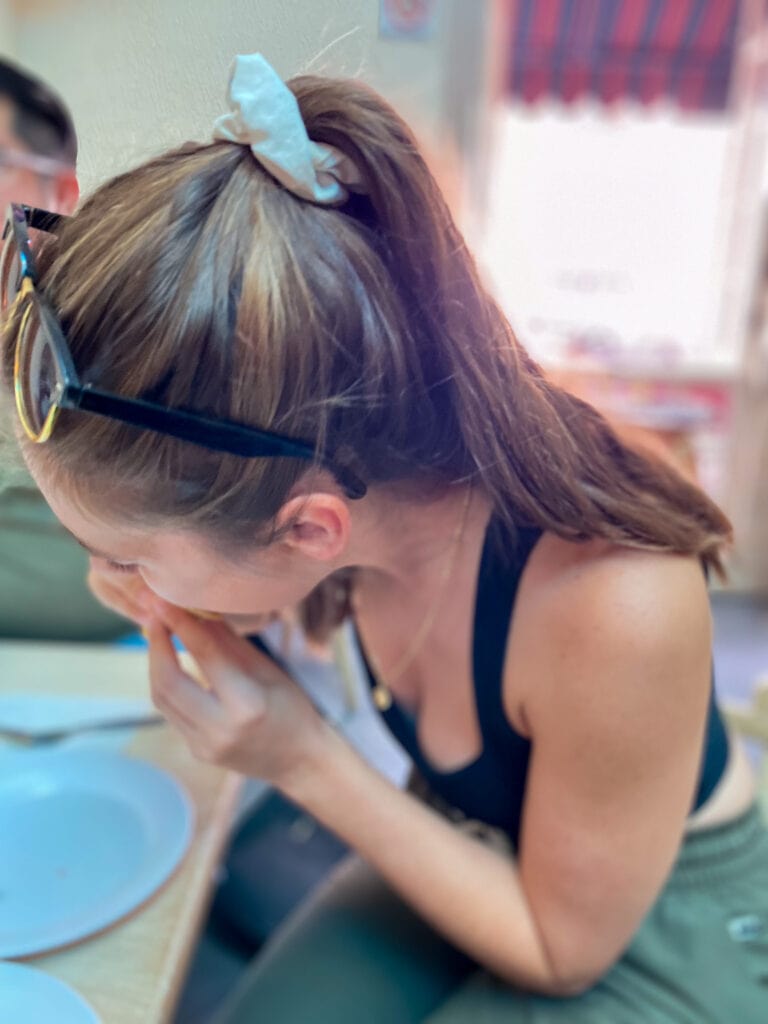 Sarah eating taco on a mexico city taco tour